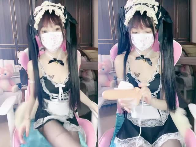 黑丝女仆装妹子肛塞尾巴,地上假屌骑坐自慰...